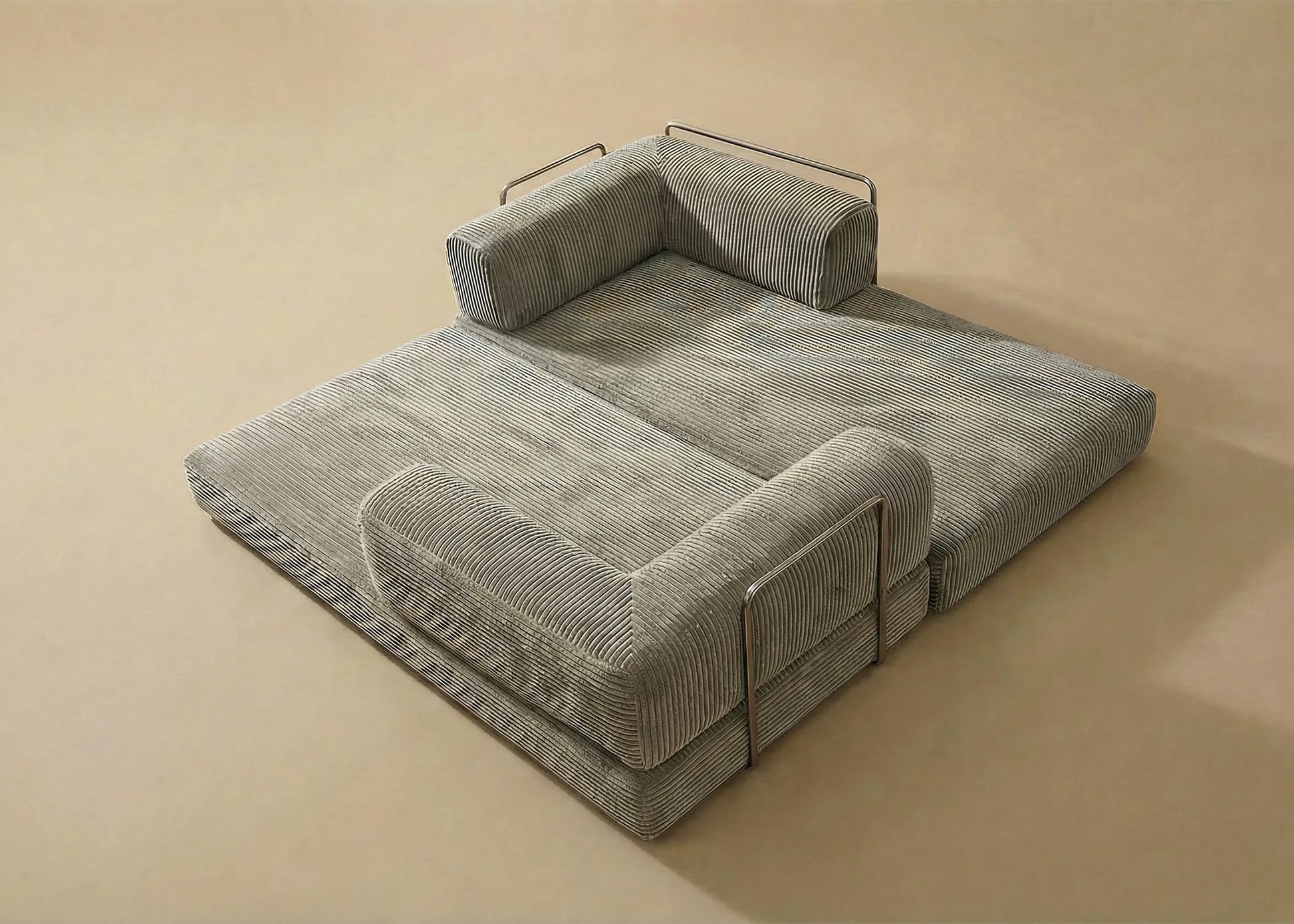 Sofá cama Taburiente desplegado en espacio minimalista con diseño contemporáneo y estructura ligera sin marco visible.