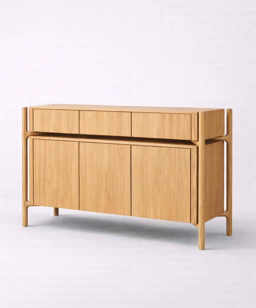 Manso (120 cm) en madera clara con diseño lineal que combina almacenamiento práctico y estilo contemporáneo sobrio
