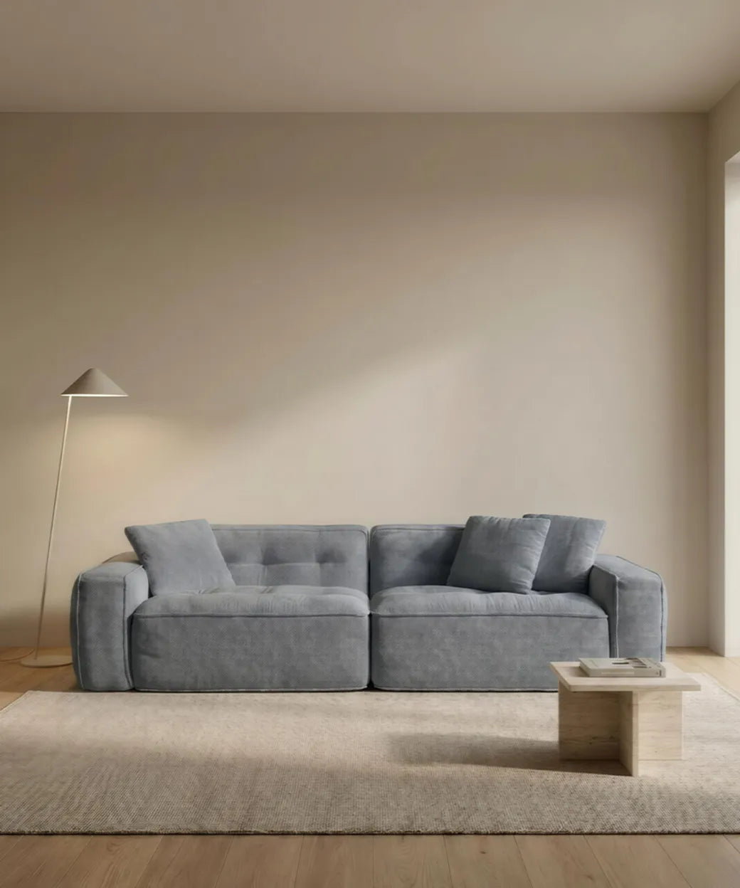 Bandama en tono azul grisáceo con diseño acolchado y líneas modernas, confortable y funcional para salones en Canarias