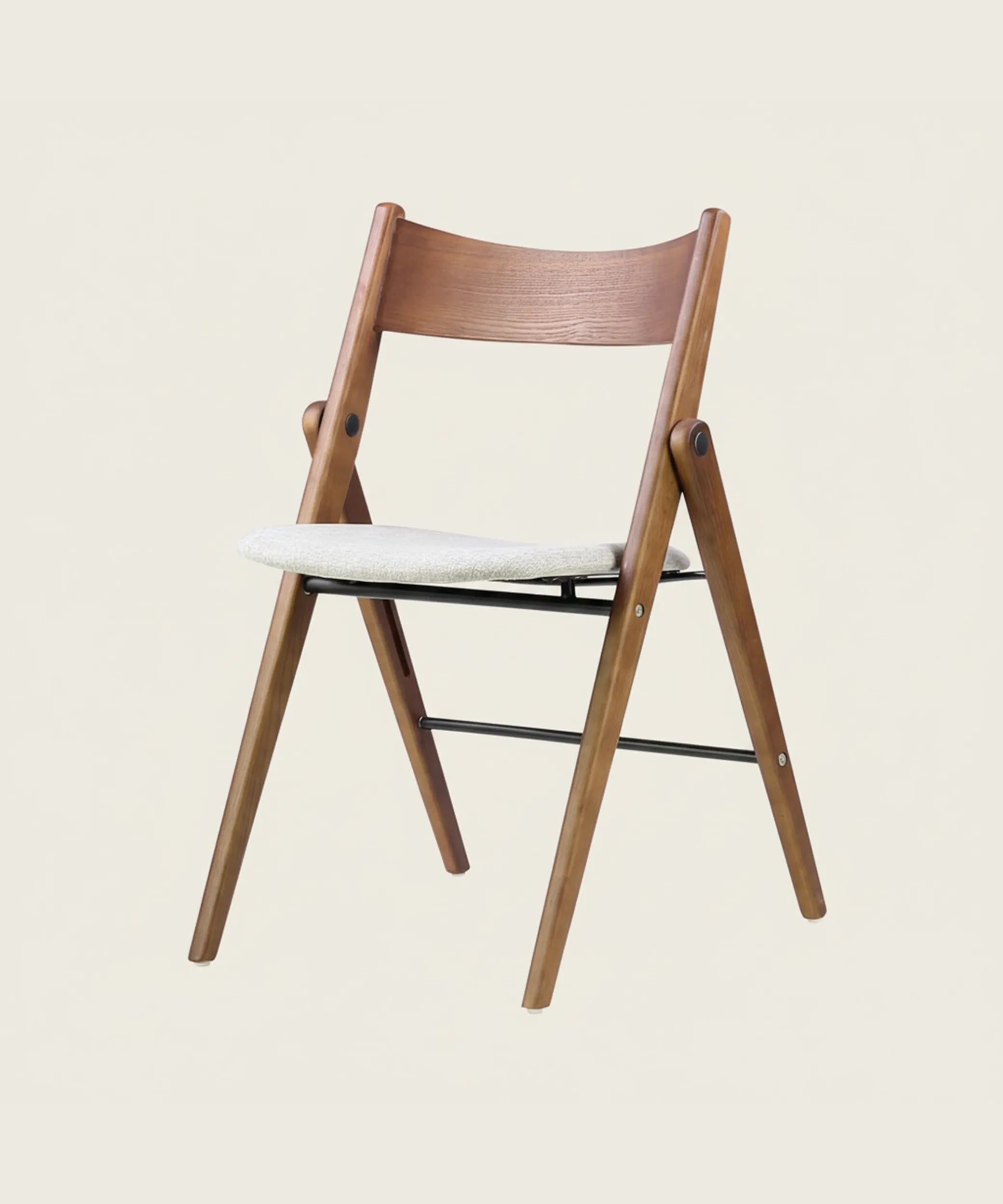 Silla Aulaga plegable en madera de fresno con asiento tapizado, diseño práctico y elegante para comedor moderno.