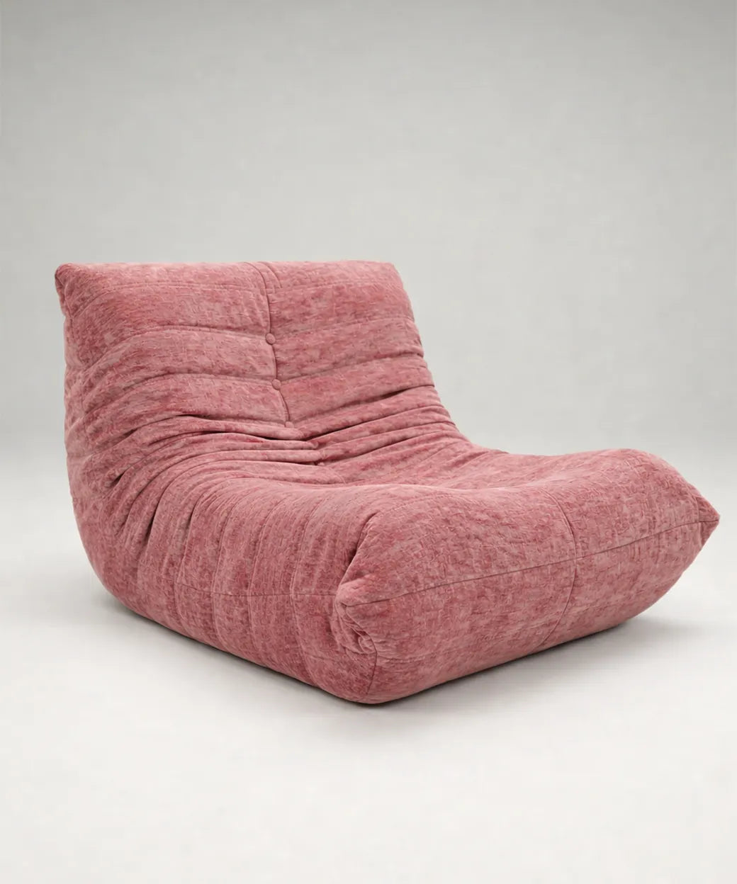 Lambra en tono rosa burdeos con diseño acolchado y suave, ideal para espacios modernos y confortables en Canarias