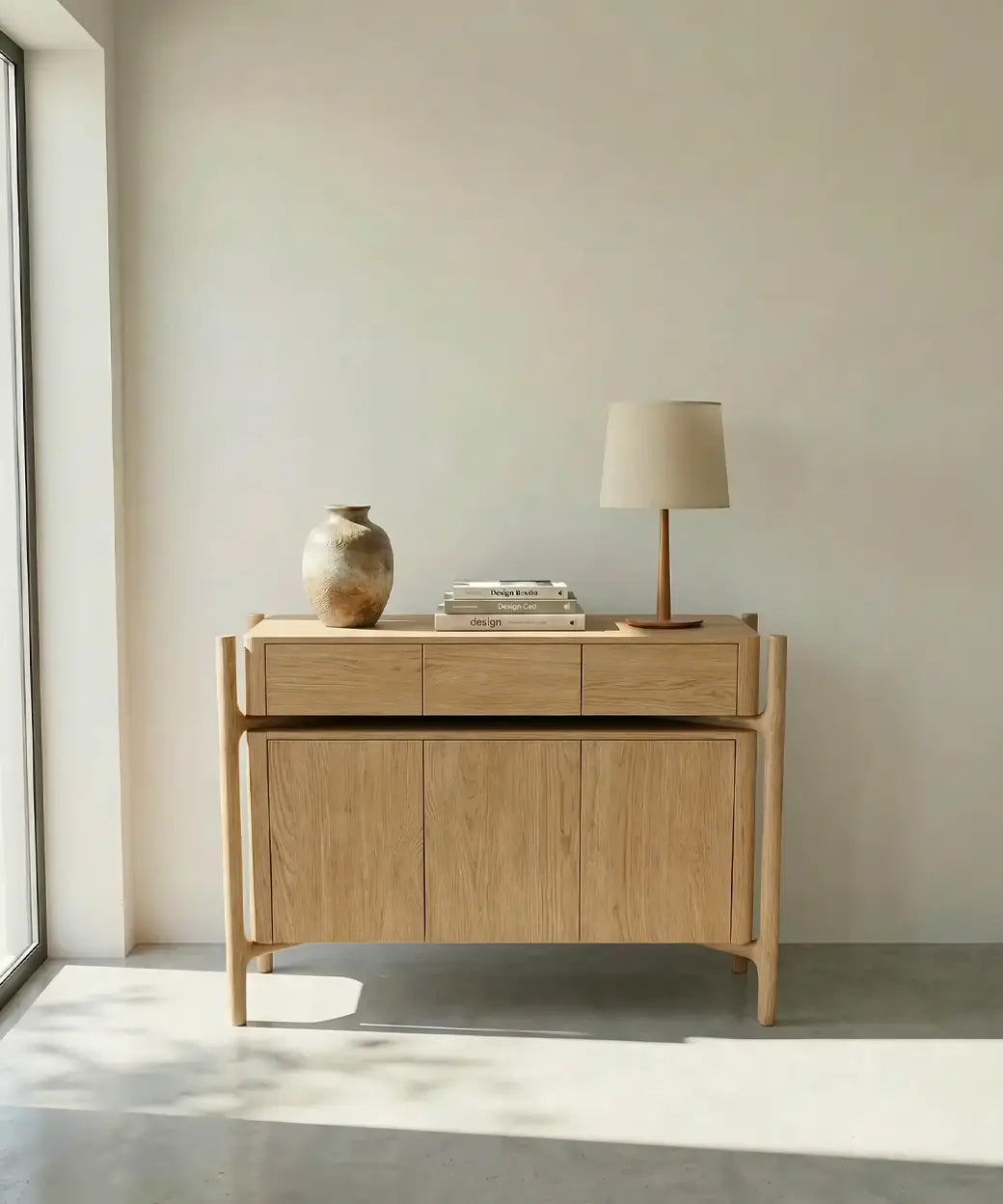 Manso (120 cm) en madera clara con diseño minimalista y estructura ligera que aporta elegancia y funcionalidad cálida