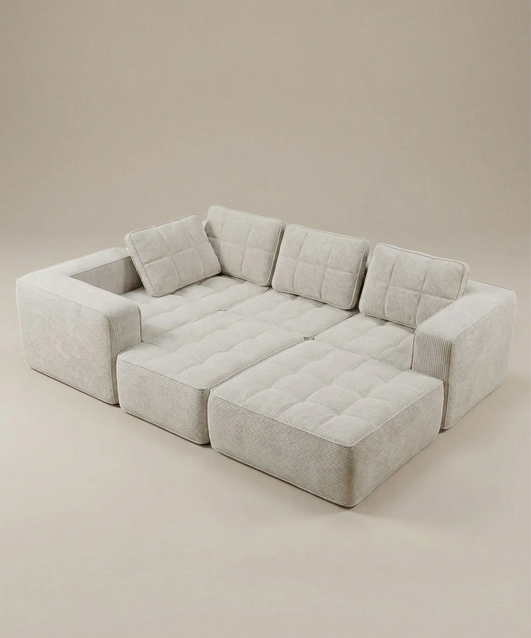 Sofá modular Cumbres en tono beige claro con diseño contemporáneo, ideal para espacios versátiles y cómodos.