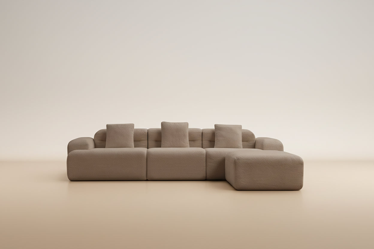 Sofá modular Haría en tonos tierra con diseño moderno y cómodo ideal para espacios contemporáneos.