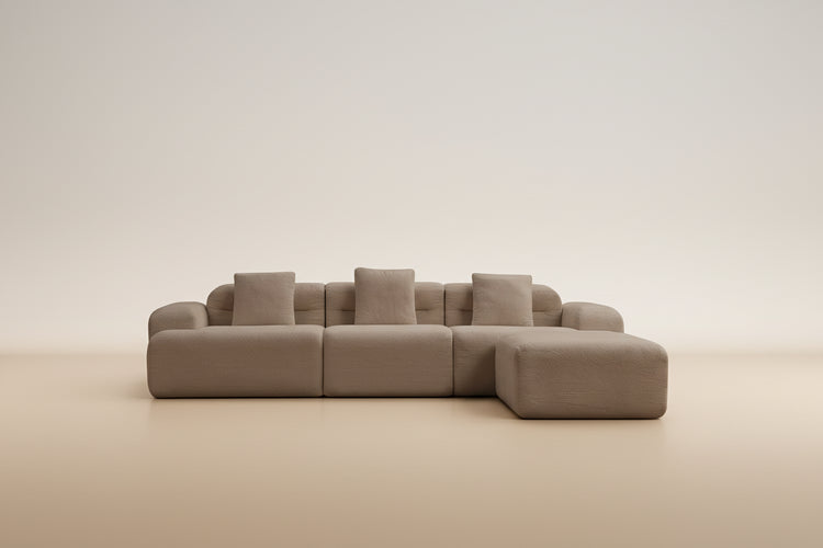 Sofá modular Haría en tonos tierra con diseño moderno y cómodo ideal para espacios contemporáneos.