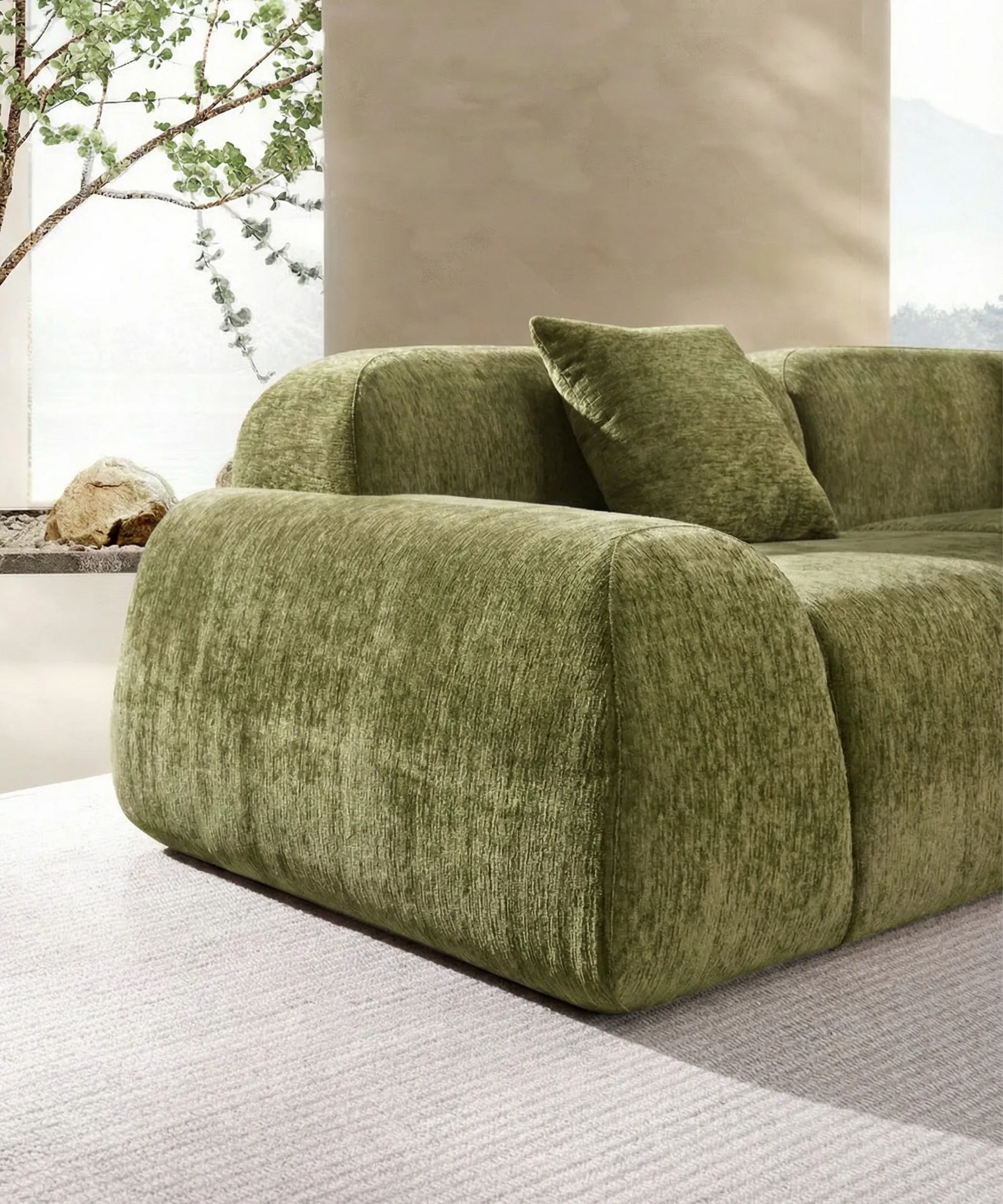 Sofá Tamadaba modular esquinero en tono verde con diseño suave y cómodo para un salón moderno y relajante.