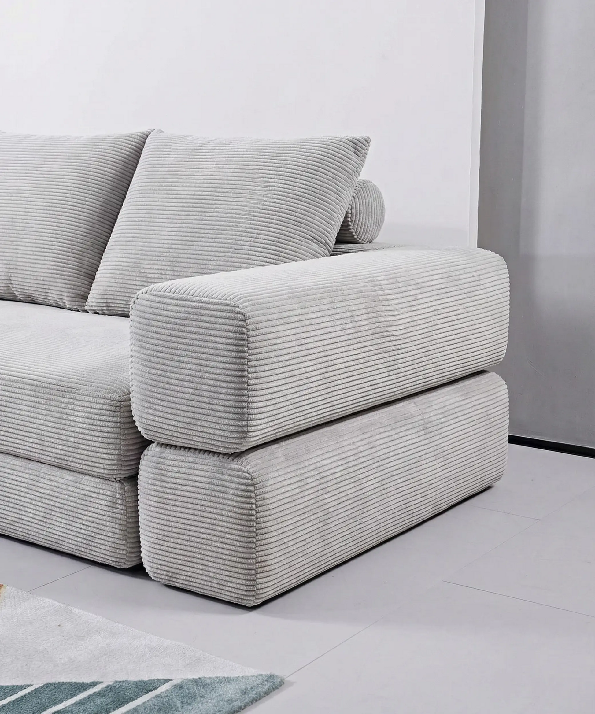 Sofá Bentayga modular en tono gris claro con diseño suave y moderno, ideal para espacios contemporáneos y confortables.