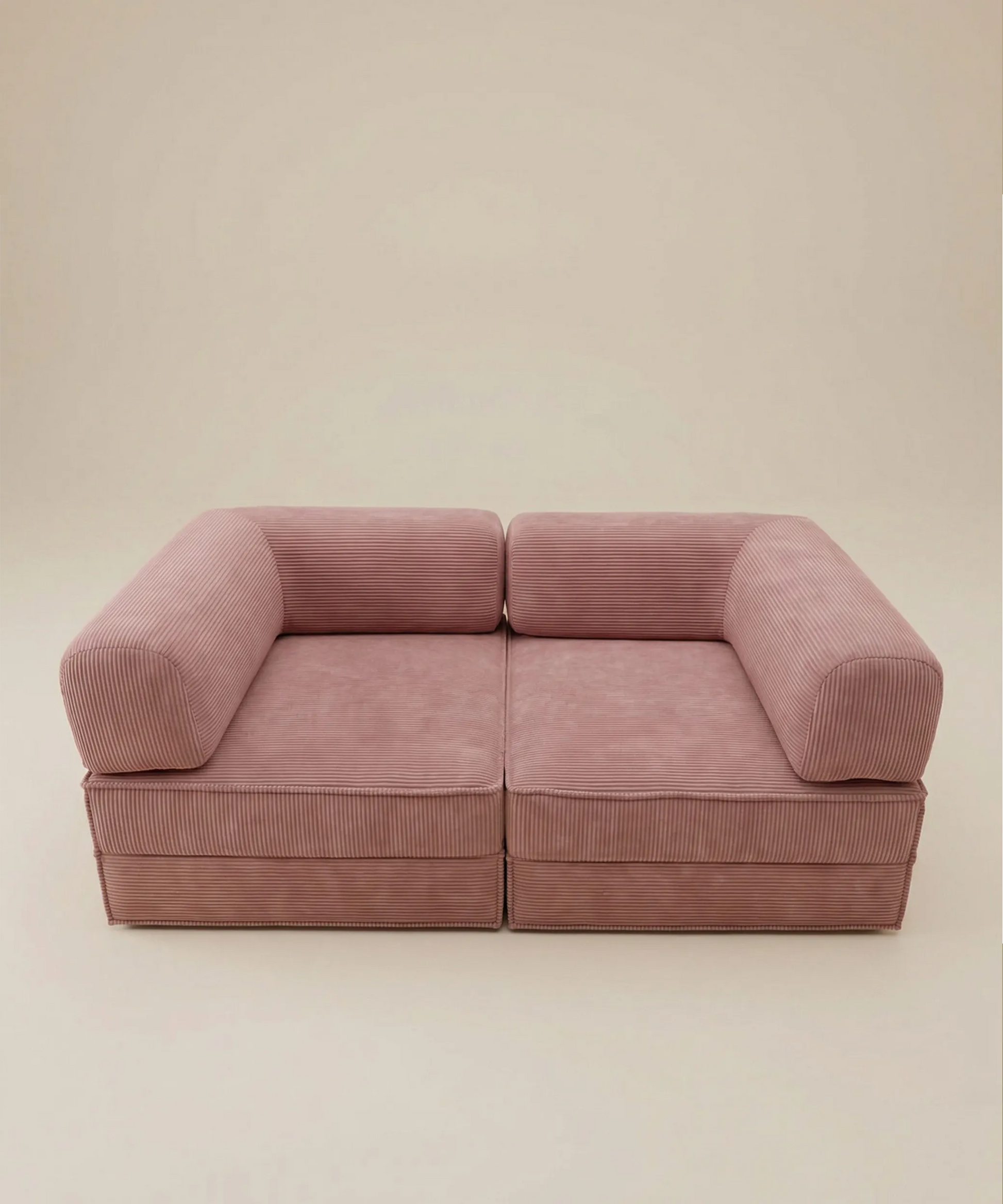Sofá modular Alisios en tono rosa con diseño contemporáneo ideal para espacios funcionales y cómodos.