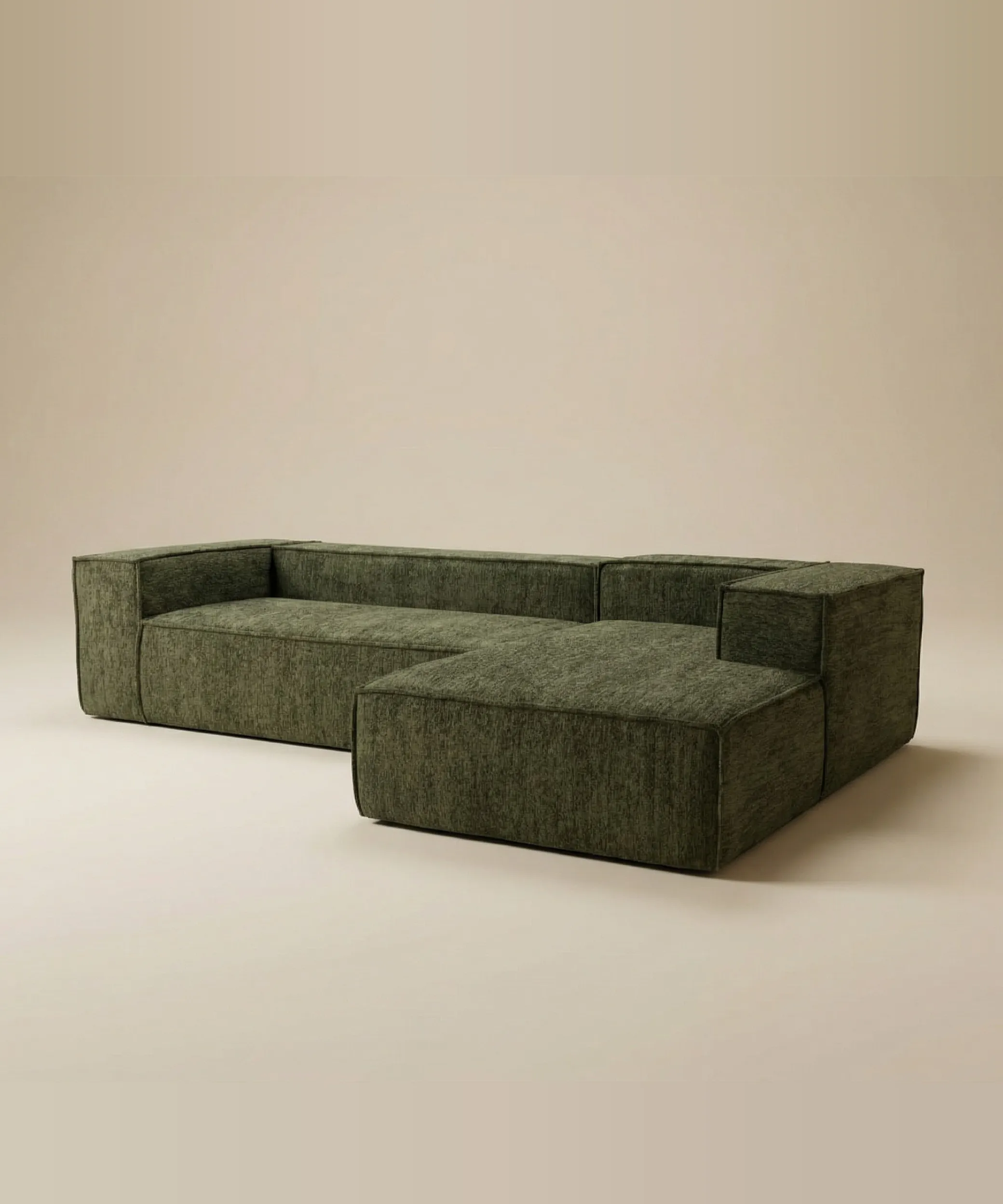 Sofá modular verde oscuro Cinchado con diseño minimalista y moderno, ideal para espacios contemporáneos y funcionales