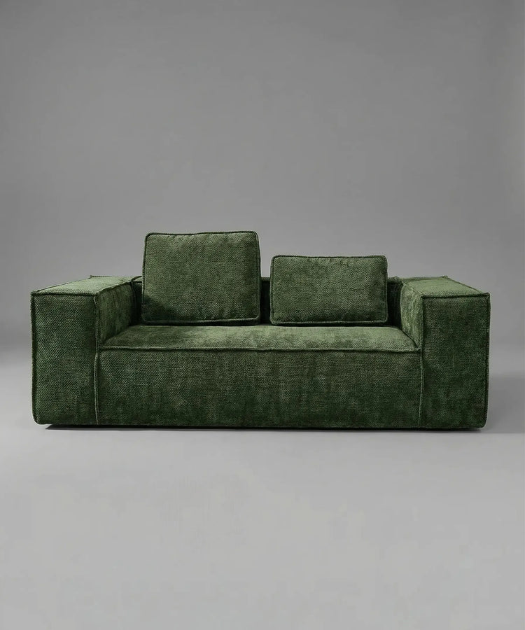 Sofá Teneguía en tono verde con diseño contemporáneo y estructura cómoda ideal para espacios modernos y versátiles.